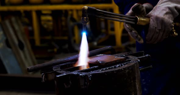Male engineer using velding torch in workshop 4k, People Stock Footage ...