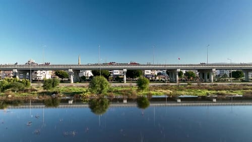 Traffic in the reflection of water aerial view 4 K