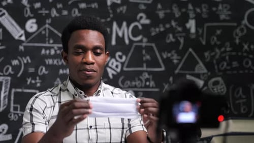 Young Adult Presenting on Camera in Classroom