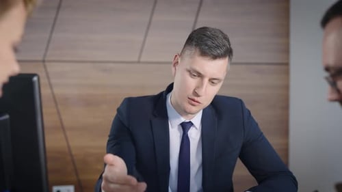 Business Meeting with Colleagues in Modern Office