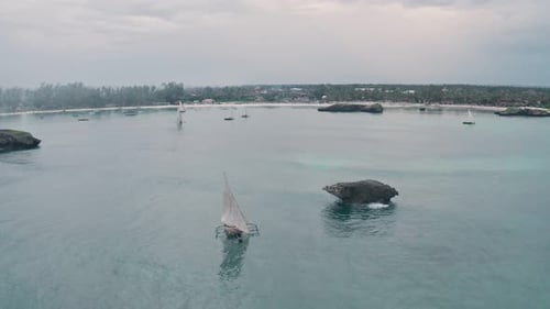 Fishing boats sailing in Watamu Bay Beach near Malindi, Kenya. Aerial drone view