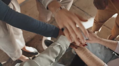 Team Putting Hands Together