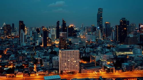 Time Lapse Night Cityscape and Highrise Buildings in Metropolis City Center