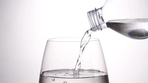 Water Pouring From Plastic Water Bottle