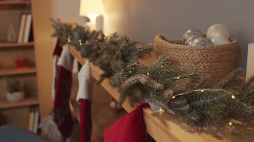 Close Up of Christmas Garland and Stockings