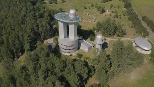 Aerial View of Modern Observatory and Forest