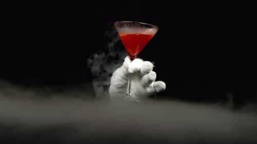 Martini Glass with Red Liquid and Smoke