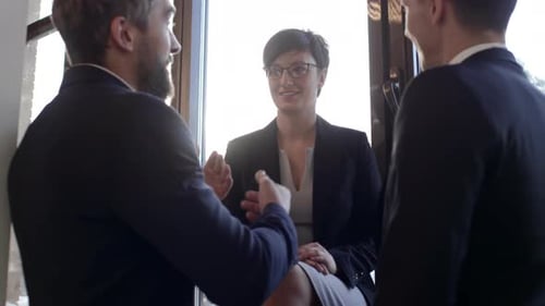 Office Workers Speaking and Explaining Something