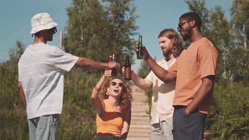 Friends Toasting with Beverages on Sunny Day
