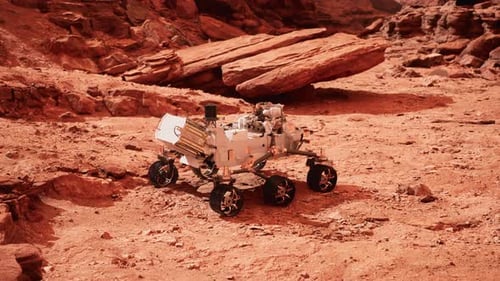 Futuristic Mars Rover Exploring Red Alien Planet Landscape