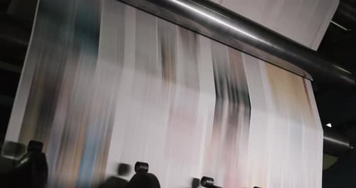 Print Plant Factory. Newspaper Printing at a Plant. Newspaper Printed on a Printing House Machine