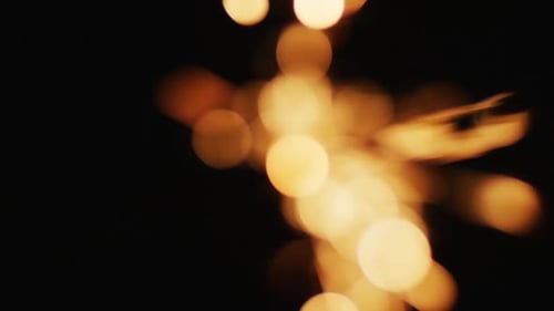Abstract Bokeh of Golden Yellow Light Flares