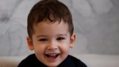 Face of a Small Smiling Boy