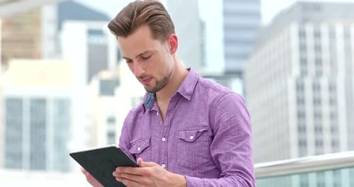 Man use of tablet computer at outdoor