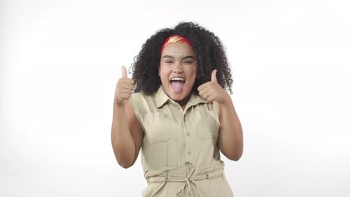 Woman Gives Thumbs Up in Approval and Excitement