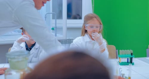 Children in Science Class Doing Experiment