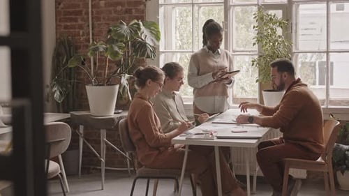 Team Working Together in a Bright Modern Office