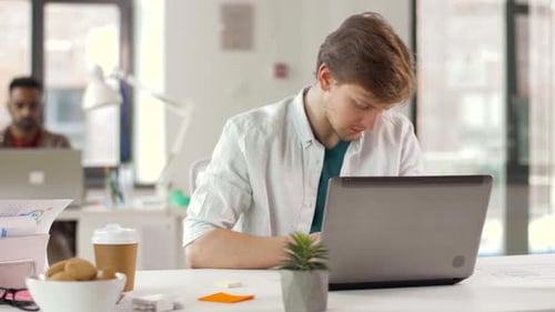 Creative Male Office Worker with Laptop 20