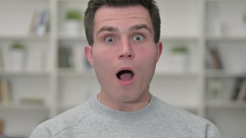 Man Reacts with Shock and Surprise Close Up