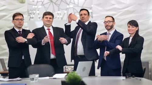 Confident Team Poses in Bright Modern Office