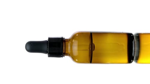 Close up of amber dropper bottle
