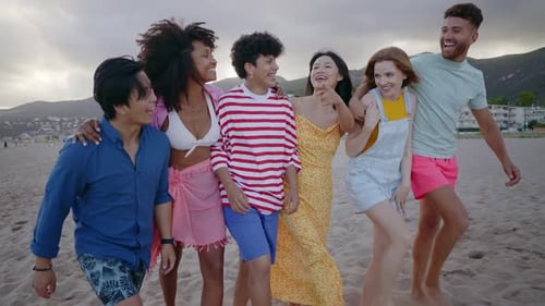 Group of friends having fun on the beach.