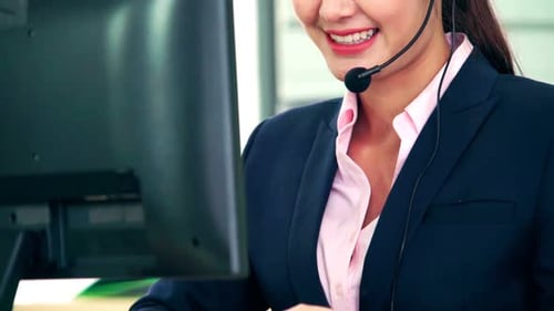 Business People Wearing Headset Working in Office