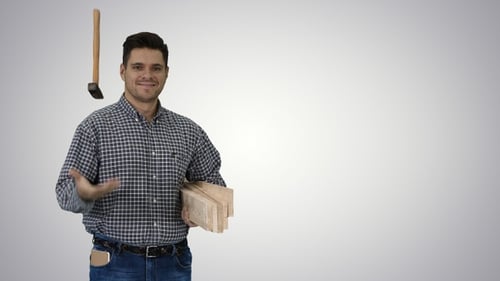 Man Carrying Wood Planks Smiles