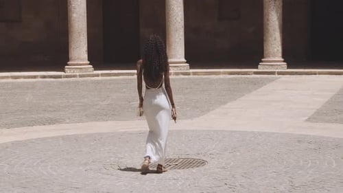 Tourist Filming Palace Courtyard In Alhambra