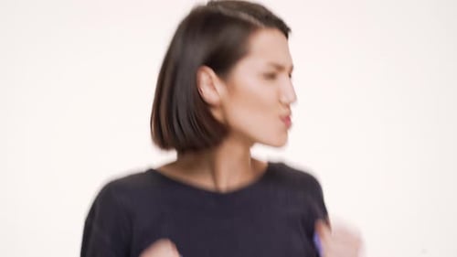 Young Woman Making Faces and Gestures