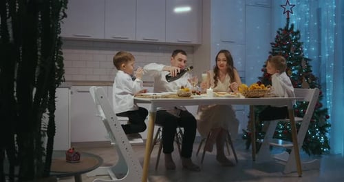 Family Celebrates Christmas Holiday at Home