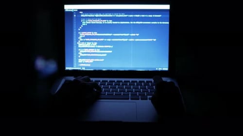 Programmer Looking Code At Night
