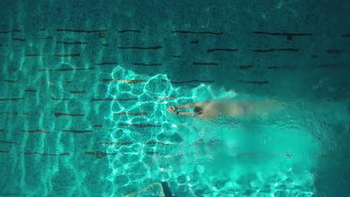 Man Swimmer in the Pool- Aerial View