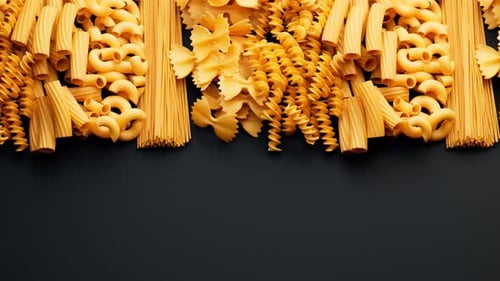 Animated Pasta Assortment Moving on Dark Background