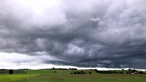 Ominous Storm Clouds Rolling Over Rural Field