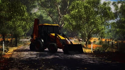 Tractor excavador en Bush Forest