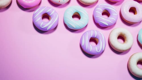 Pastellfarbene, bunt glasierte Donuts. Nahtlose Looping-Animation. Süßer Nachtisch.