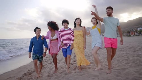 Group of friends having fun on the beach.