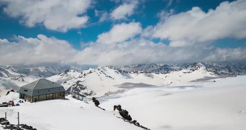 Timelapse Mountain Clouds Over Beautiful Snowcapped Peaks of Mountains and Glaciers