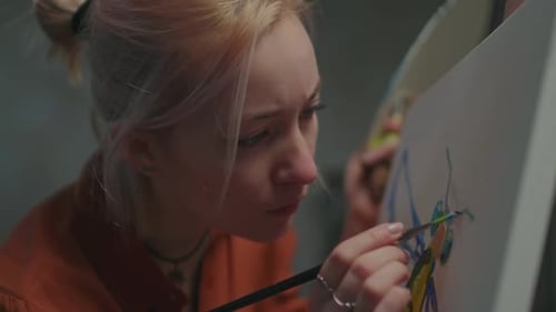 Female Painter in Creative Process in Art Studio