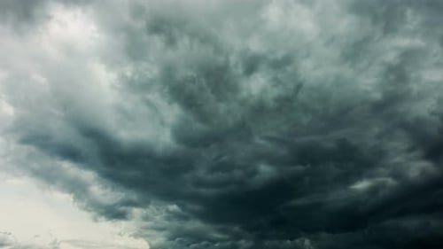 Time Lapse of Dark Clouds Moving Across Sky