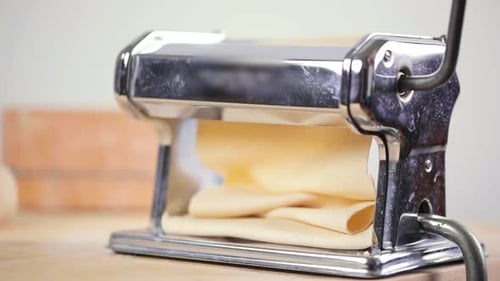 Pasta Dough Flattened with Rolling Machine