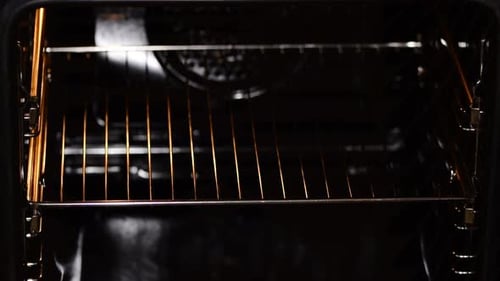 Cupcake Batter Placed in Oven for Baking