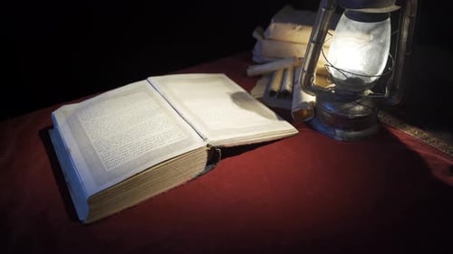 Open Book and Antique Lamp Still Life