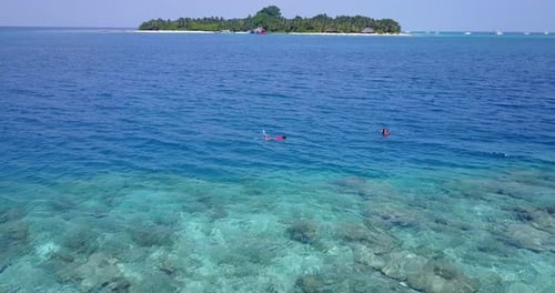 Wide angle fly over abstract shot of a summer white paradise sand beach and turquoise sea background
