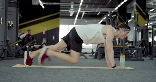 Young Adult Male Doing Mountain Climber Exercise