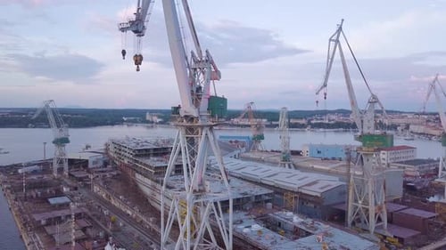 Aerial View of Shipyard with Cranes and Ships