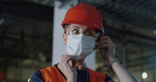 Worker Wearing Face Mask in Industrial Setting
