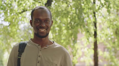 Portrait of Happy Afro-American Man in Park