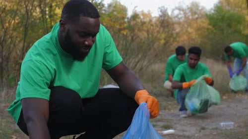 Ecology Activist Smiling at Camera During Work